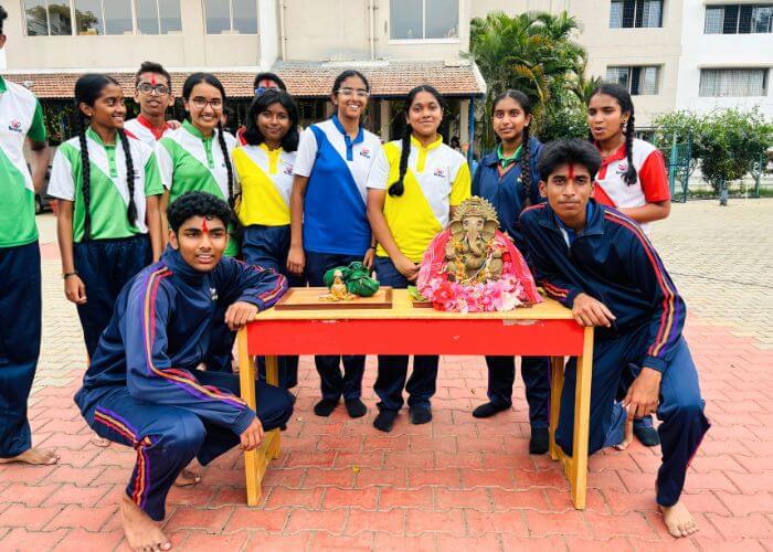Group of students celebrating a cultural event at NewAge World School